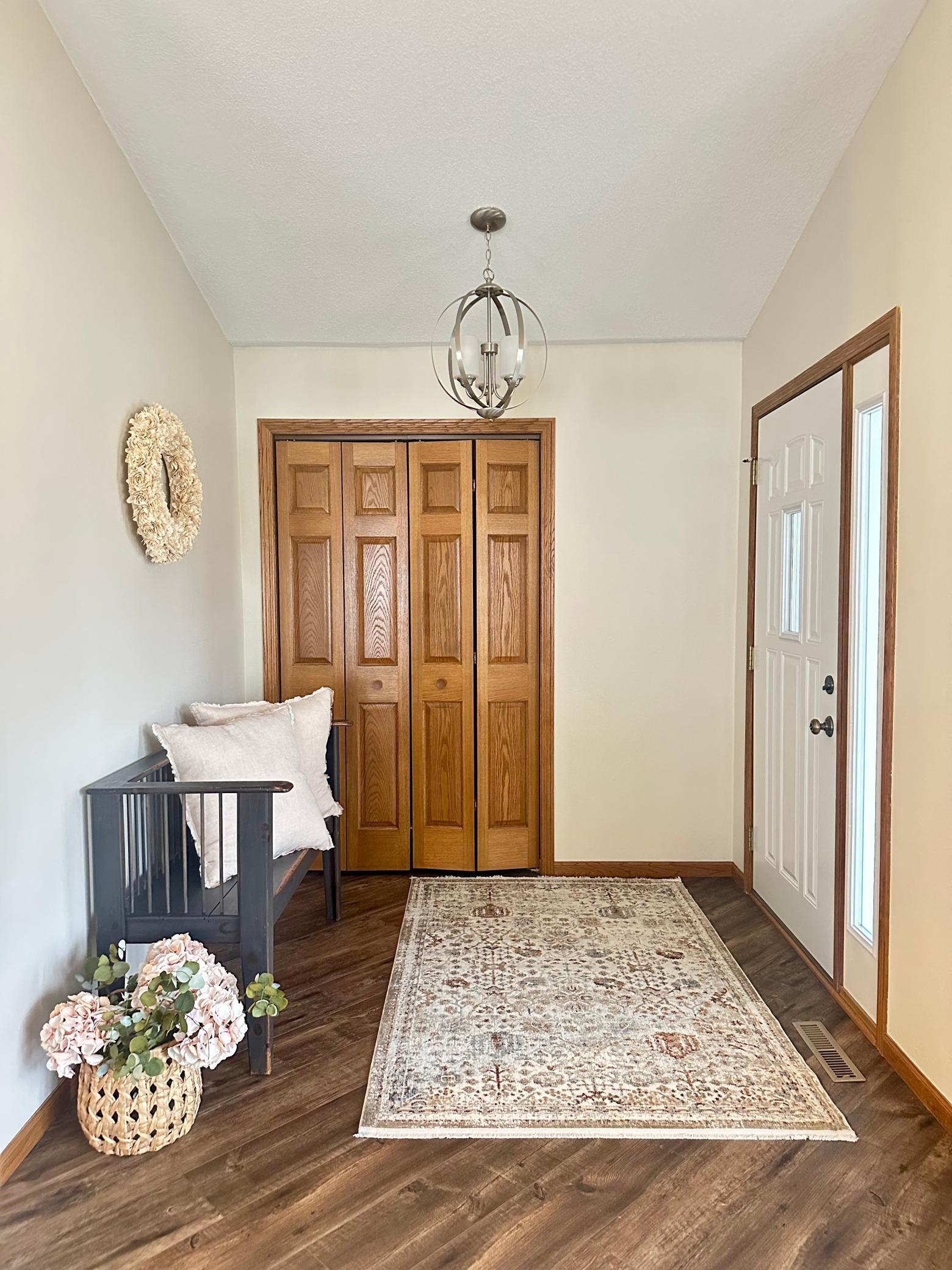 Inside entry includes ample space to welcome others and also a coat closet–no steps to navigate coming or going