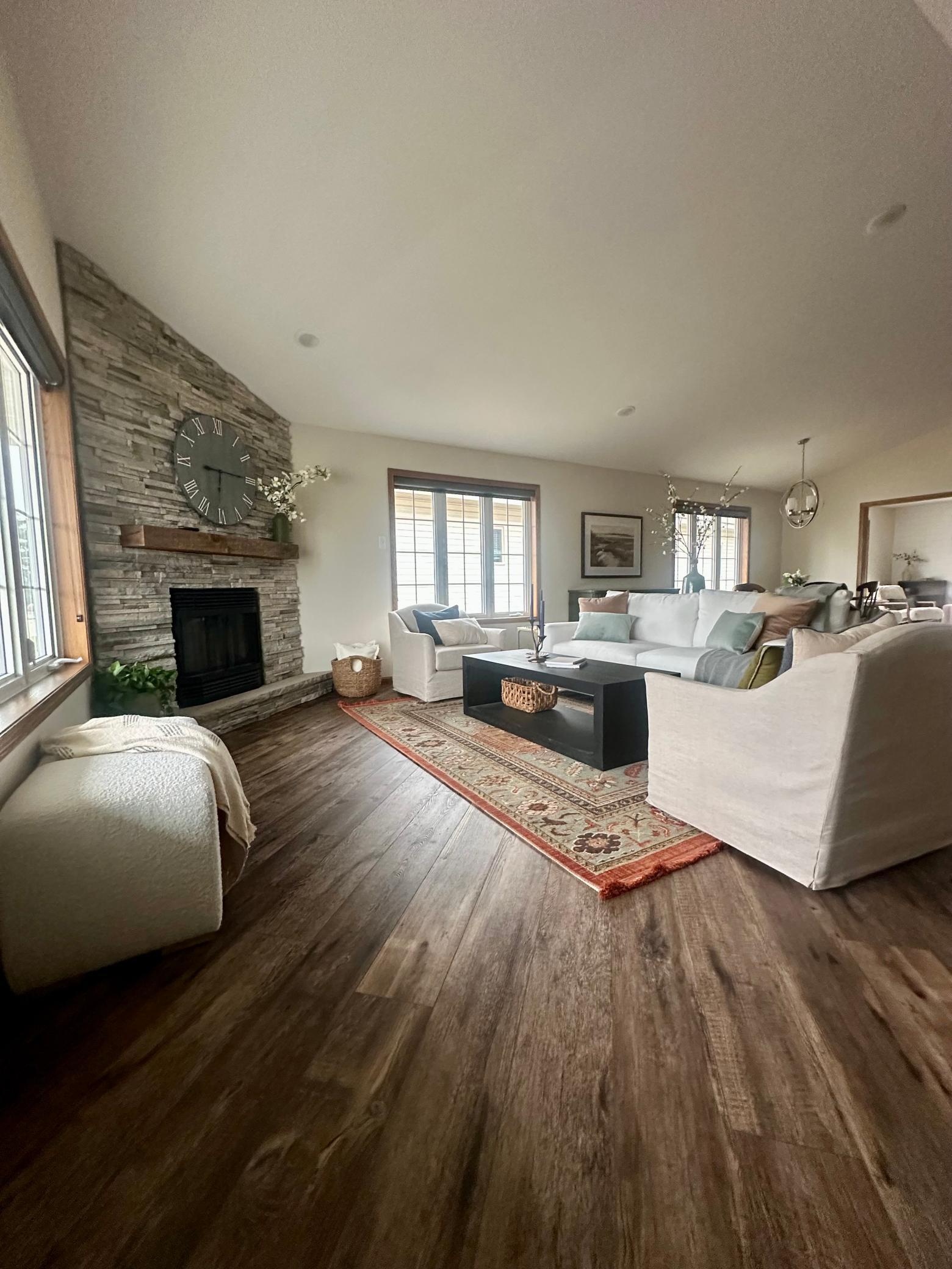 Spacious Living Room with gas fireplace and vaulted ceiling
