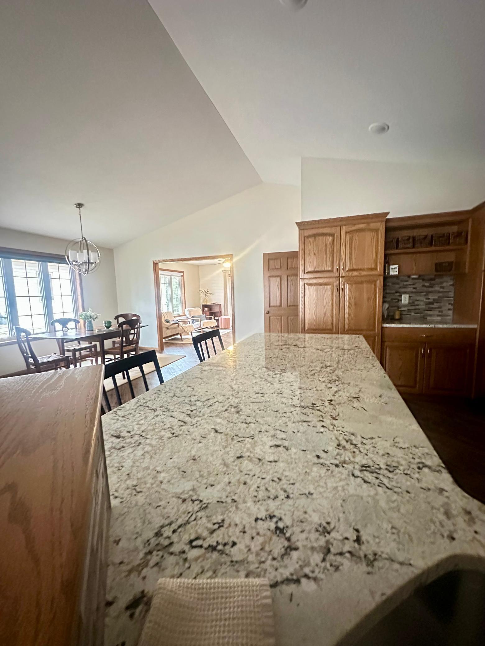 Large Granite Counter provides an awesome workspace!
