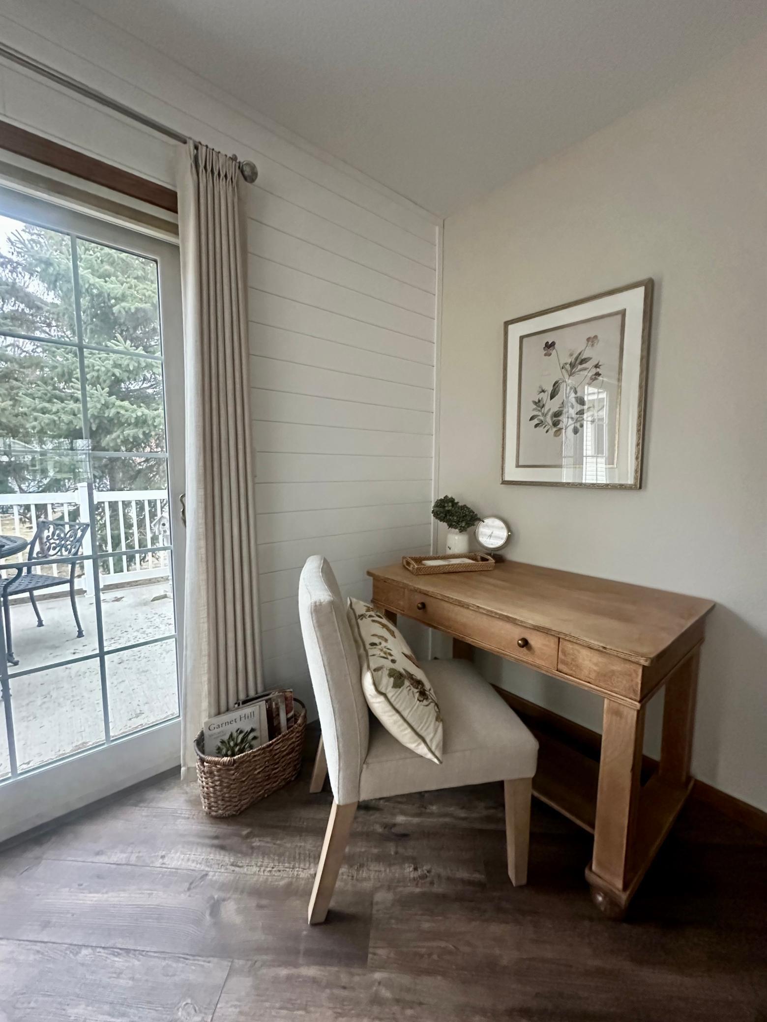 Sunroom is spacious enough to accommodate a desk or craft space