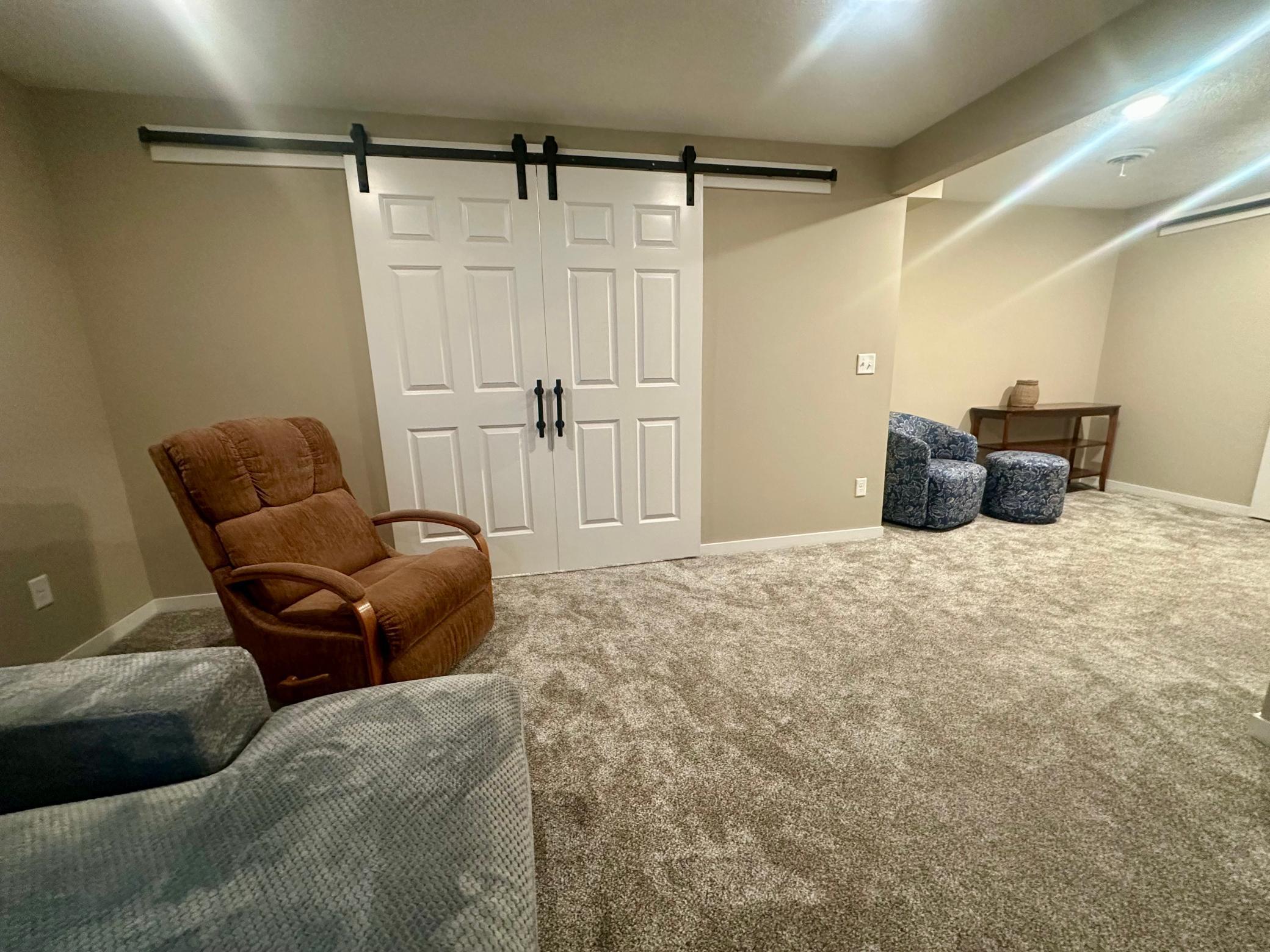 Lower Level Bedroom has Sliding Doors