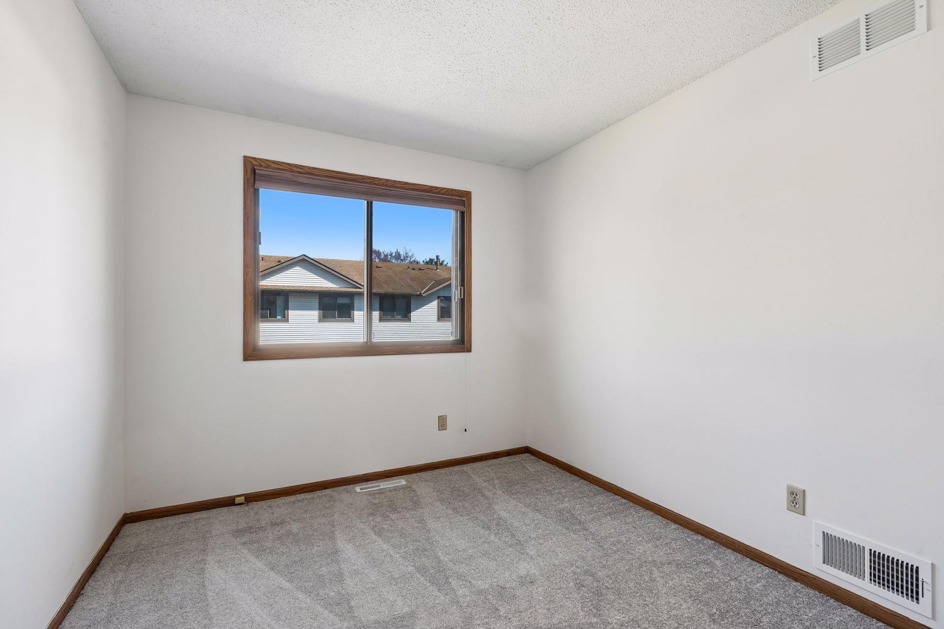2nd bedroom has fresh paint and new carpet.