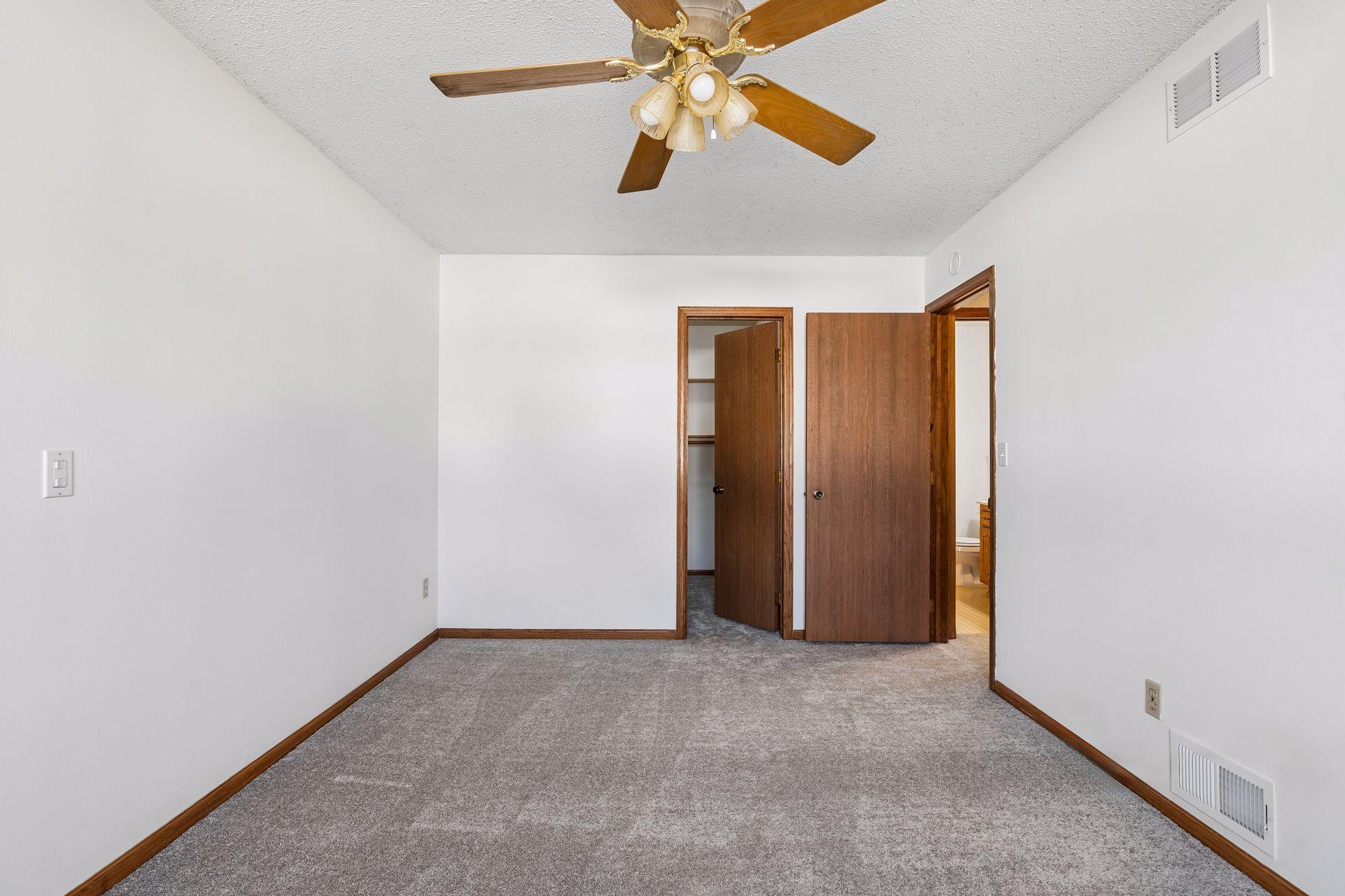 Primary bedroom has a walk in closet with fresh paint.