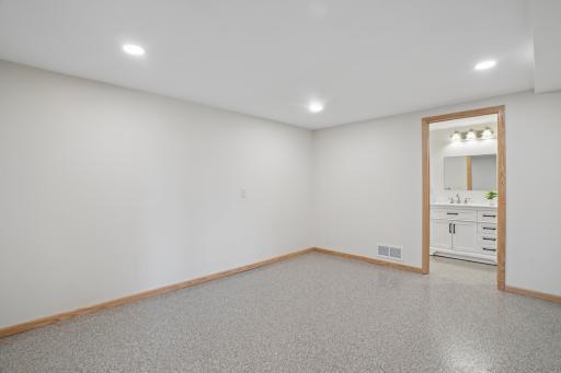 Lower level mud room could function as a hobby space or office area