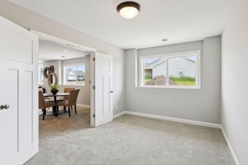 Flex room in lower level allows you to create a space especially for your family's needs - exercise room, playroom, hobby room, etc. (Photo of a previously built Summit Floorplan)