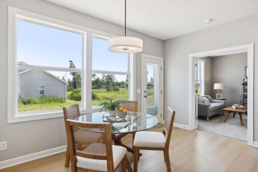 The informal dining room is just steps away from the kitchen. (Photo of a previously built Summit Floorplan)