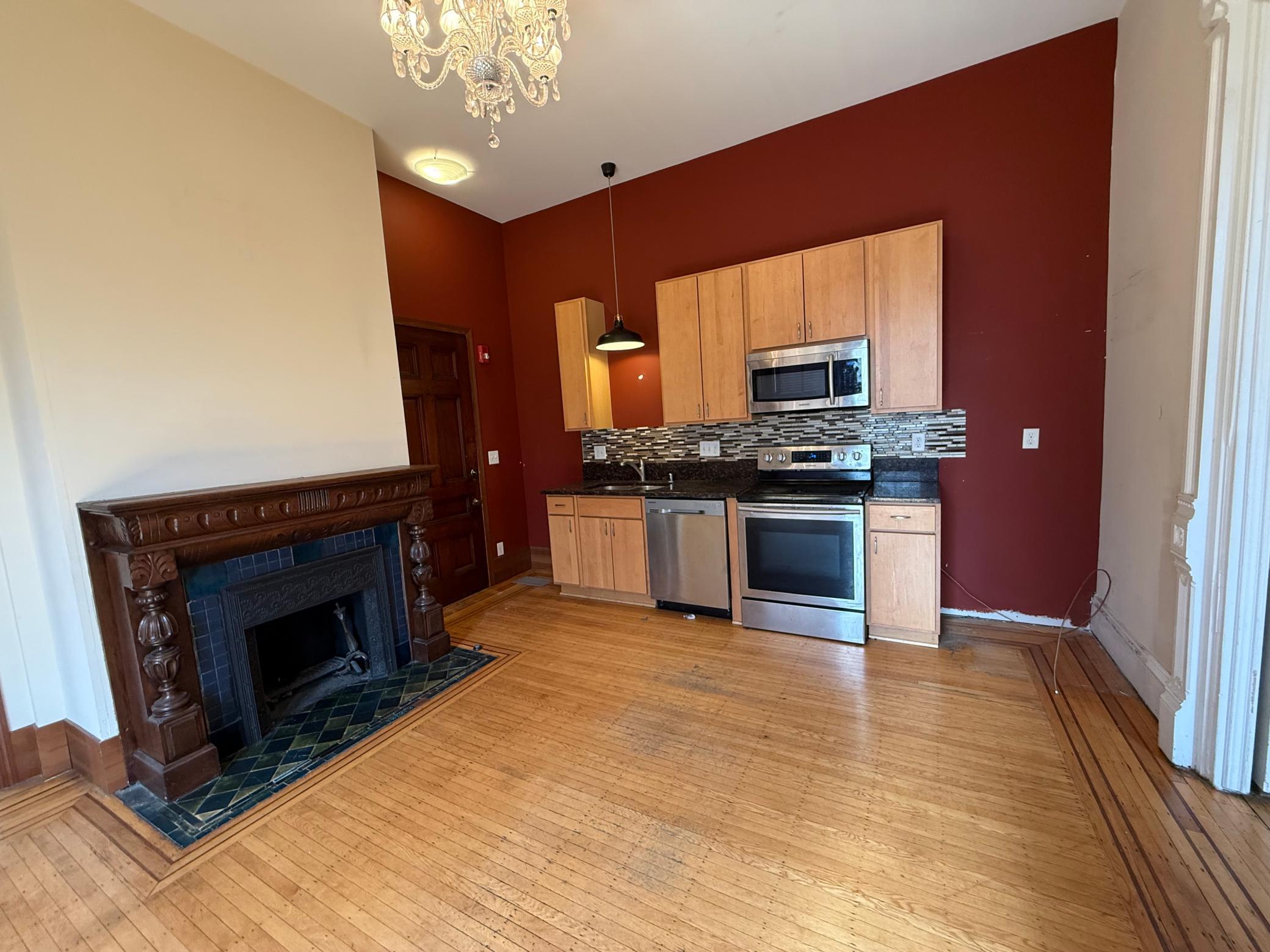 Kitchen and fireplace in main area