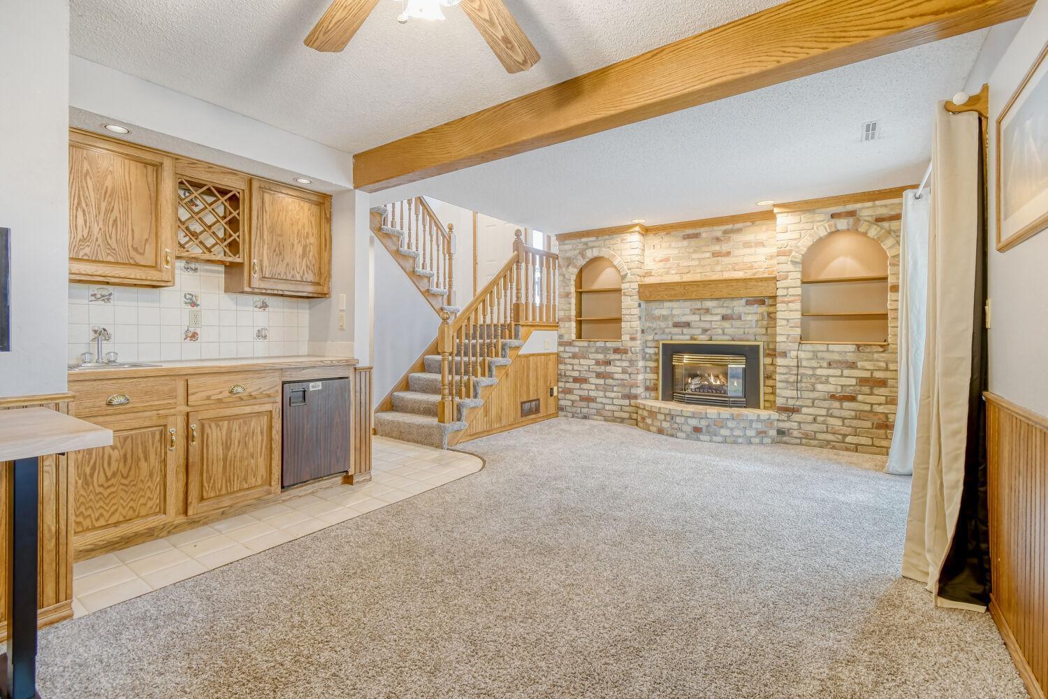 Lower Level Family Room W/ Fireplace and Wet Bar
