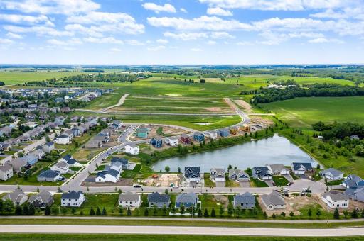 Aerial view of homes and pond at Bridle Creek in Jordan