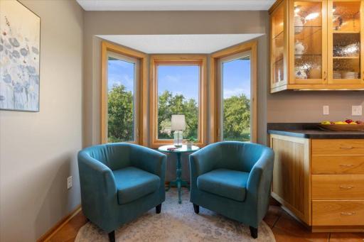 Sitting nook, bay window, garden views - A reading nook with a view of six acres. The only hard part is choosing the book.