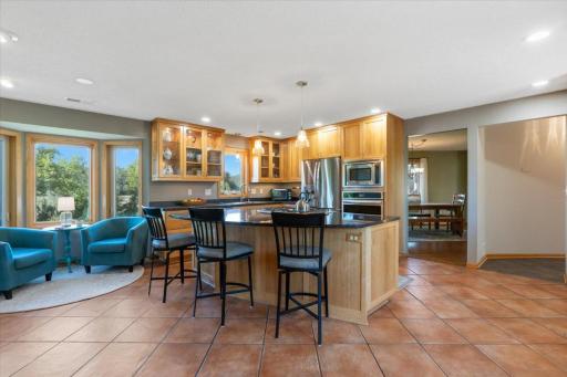 Pull up a stool. The kitchen island at 1200 Game Farm Circle is where the mornings happen.