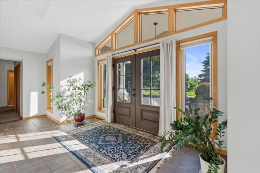 Step inside and the light does all the talking. The foyer at 1200 Game Farm Circle welcomes you like it means it.