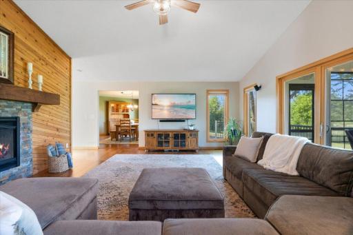 he kind of room that makes you sit down and stay a while. Natural light, warm wood floors, and a great place for everyone to congregate for movie night.