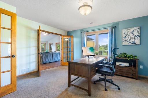 French doors expand the space or turn down the volume in the home office/flex space.