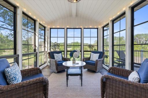 The three-season porch that makes the other three seasons jealous. Floor-to-ceiling windows, room for everyone, and a view that never gets old.