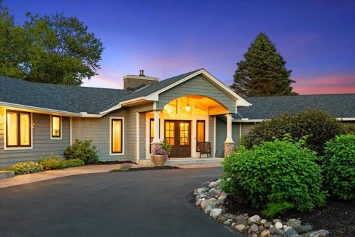 Golden hour doesn't miss at 1200 Game Farm Circle. Three thousand square feet of single-level living, and it looks like this at dusk. (And don't miss the very last photo - what a grand finale!)