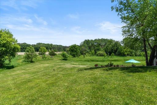 The extensive back yard space - cornhole, badminton, flag football, picnics, and parties - what a great canvas to use.
