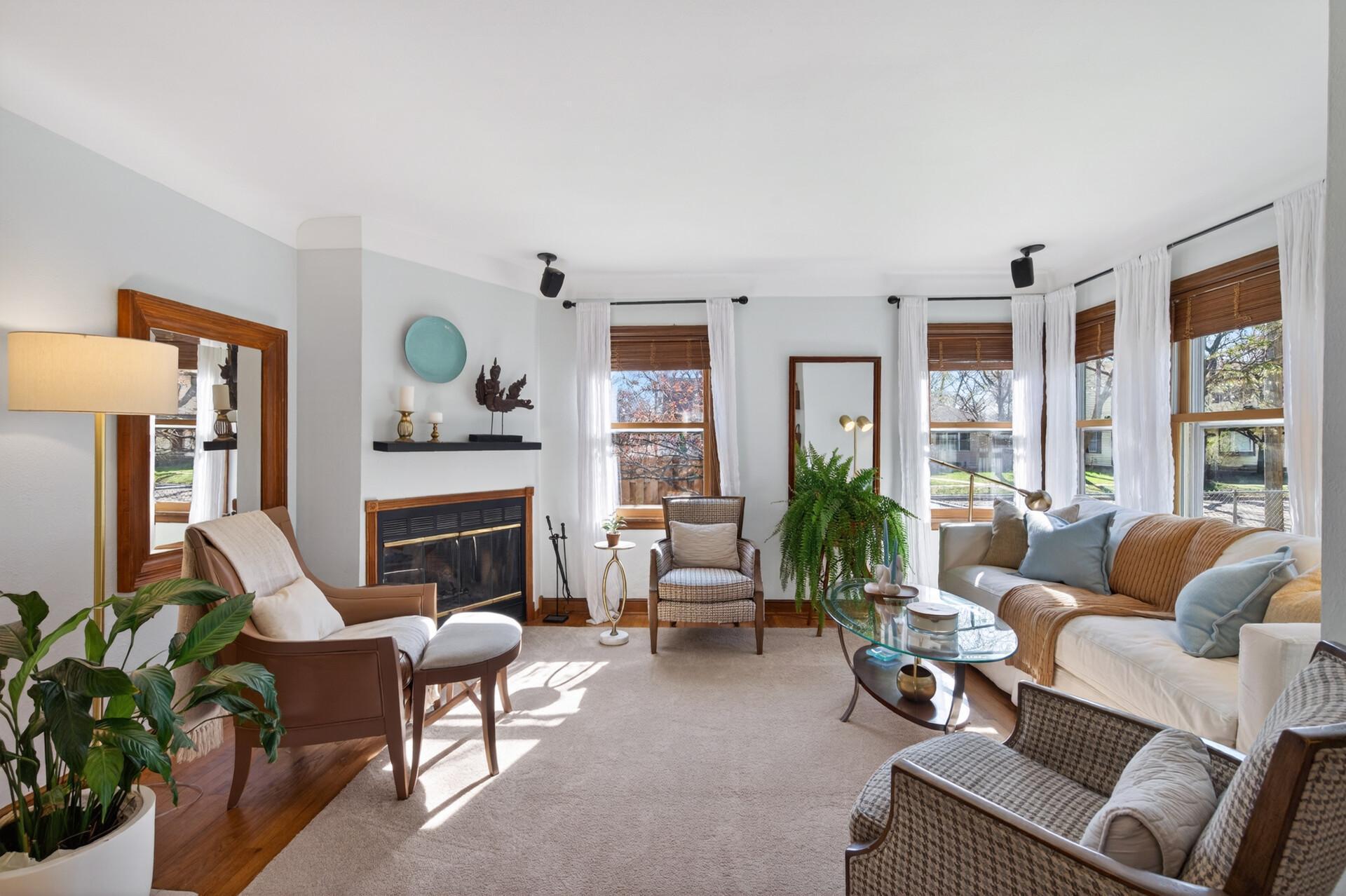 The inviting living room floods with light on a fresh spring morning.