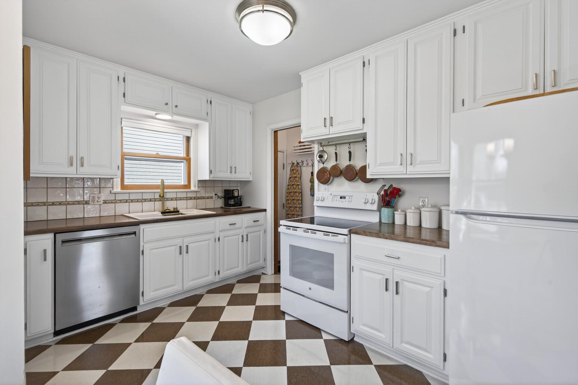 The fridge and stove have both been recently replaced. There is capped gas behind the stove should you prefer a gas unit.