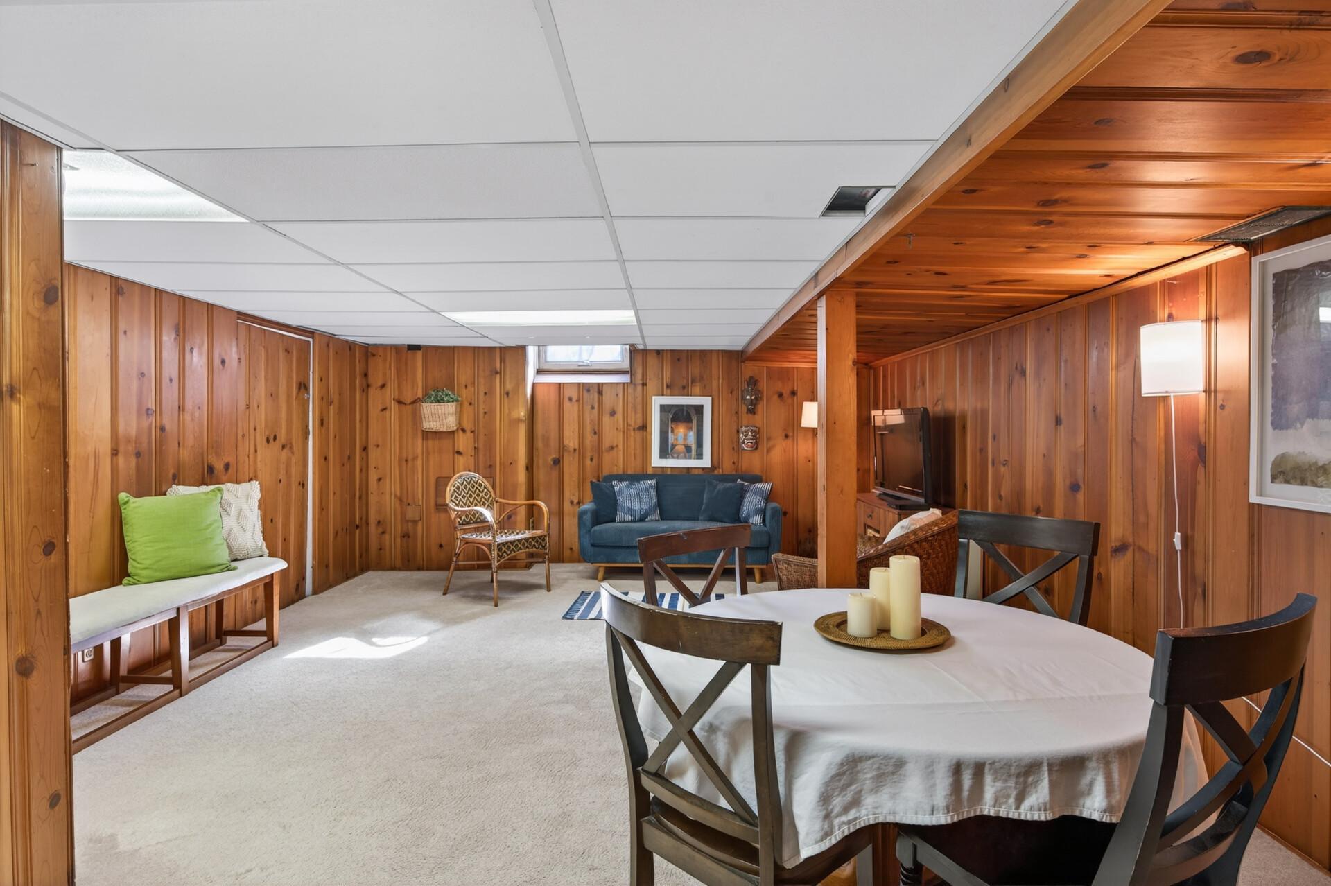 The finished lower level can be so many things: family room, workout space, and spacious private office.