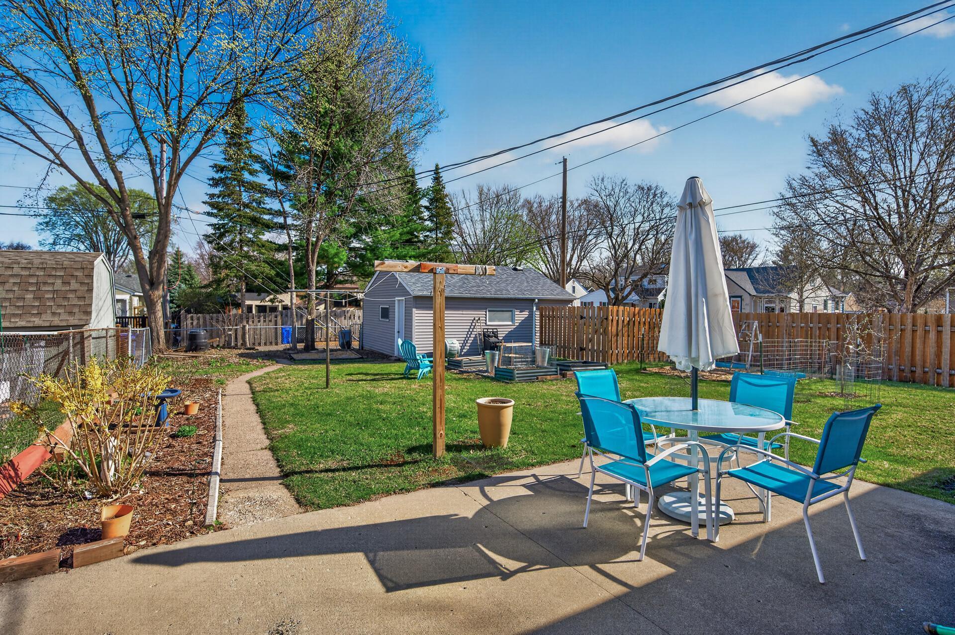 In the back is a second large patio area perfect for summer picnics or afternoon drinks. The fully fenced back yard makes it safe for children and pets.