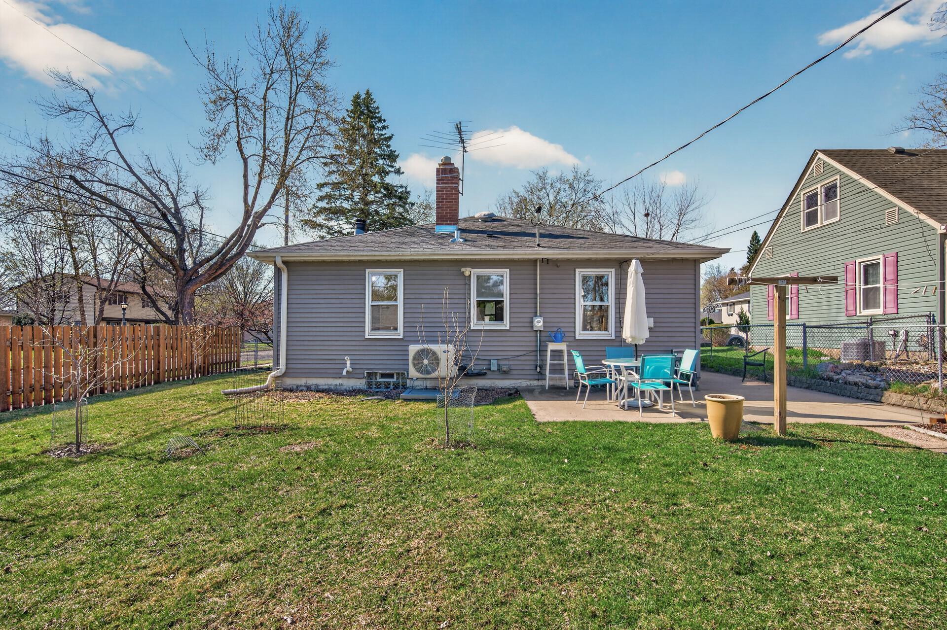 Lots of flat lawn space for croquet or bocce ball. Note the privacy fence along the west side.