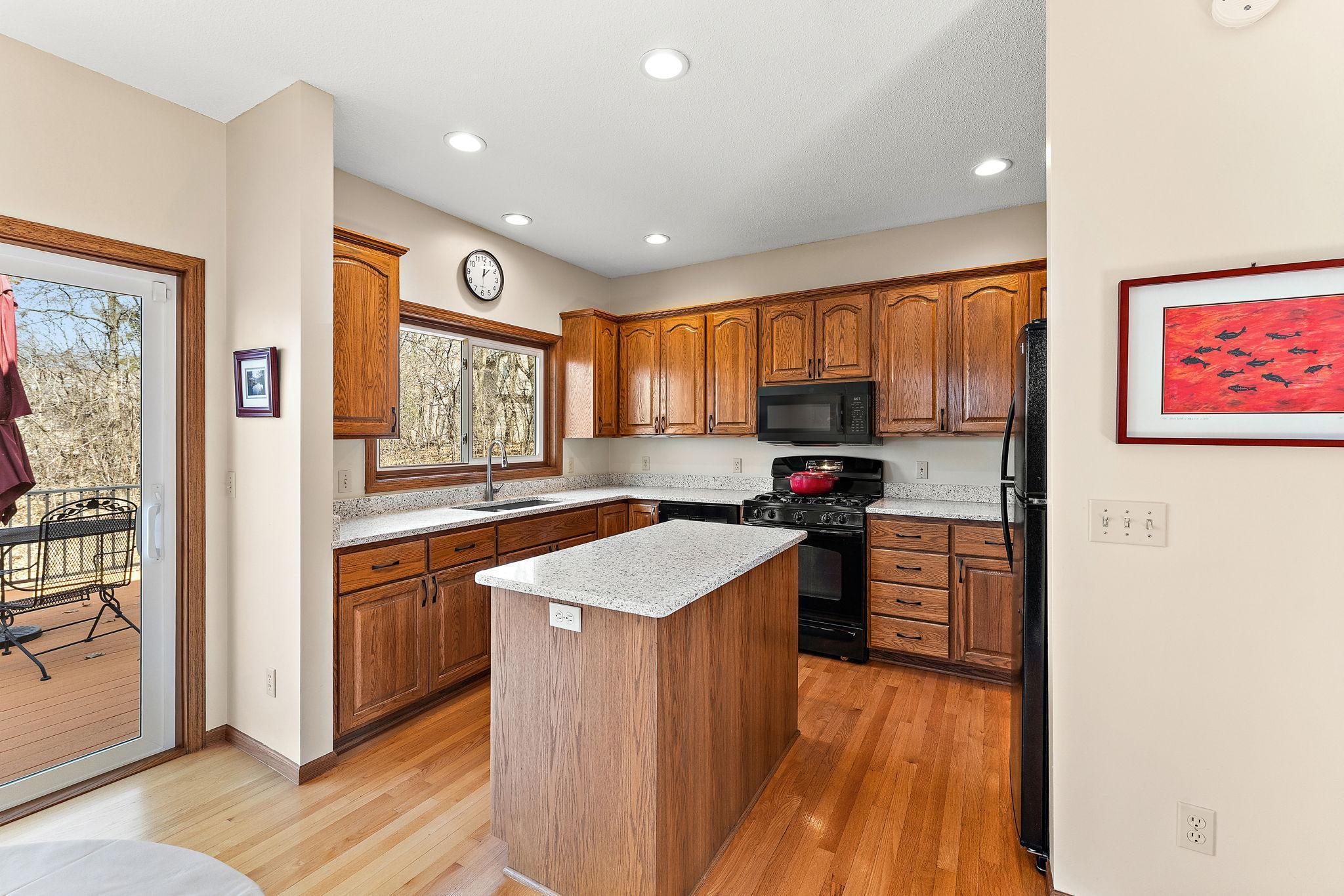 Kitchen w/quartz tops and newer appliances