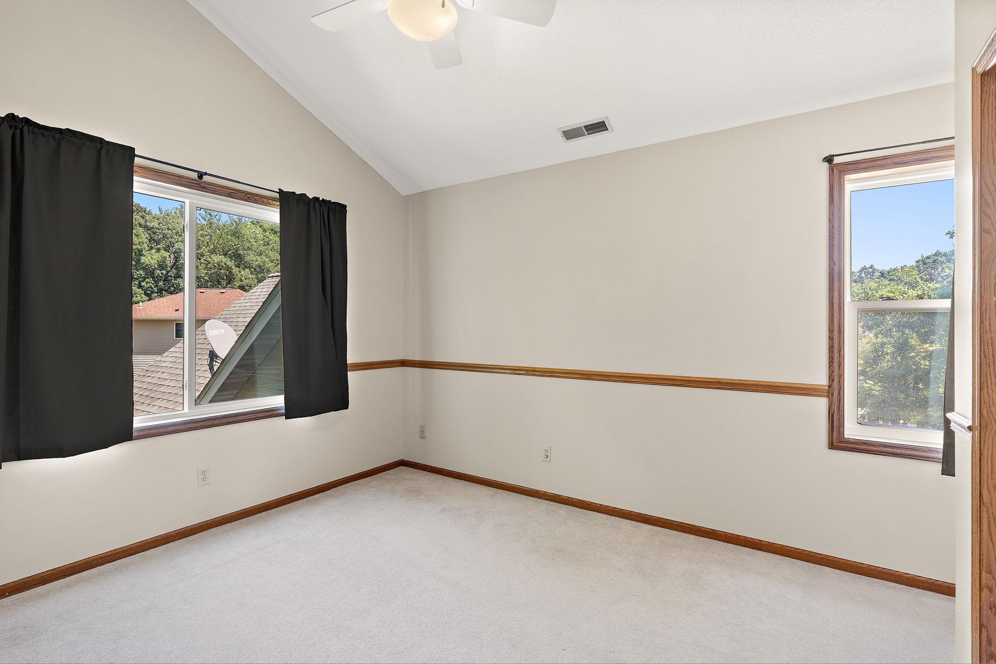 Bedroom 2 with lots of natural light and fresh neutral paint
