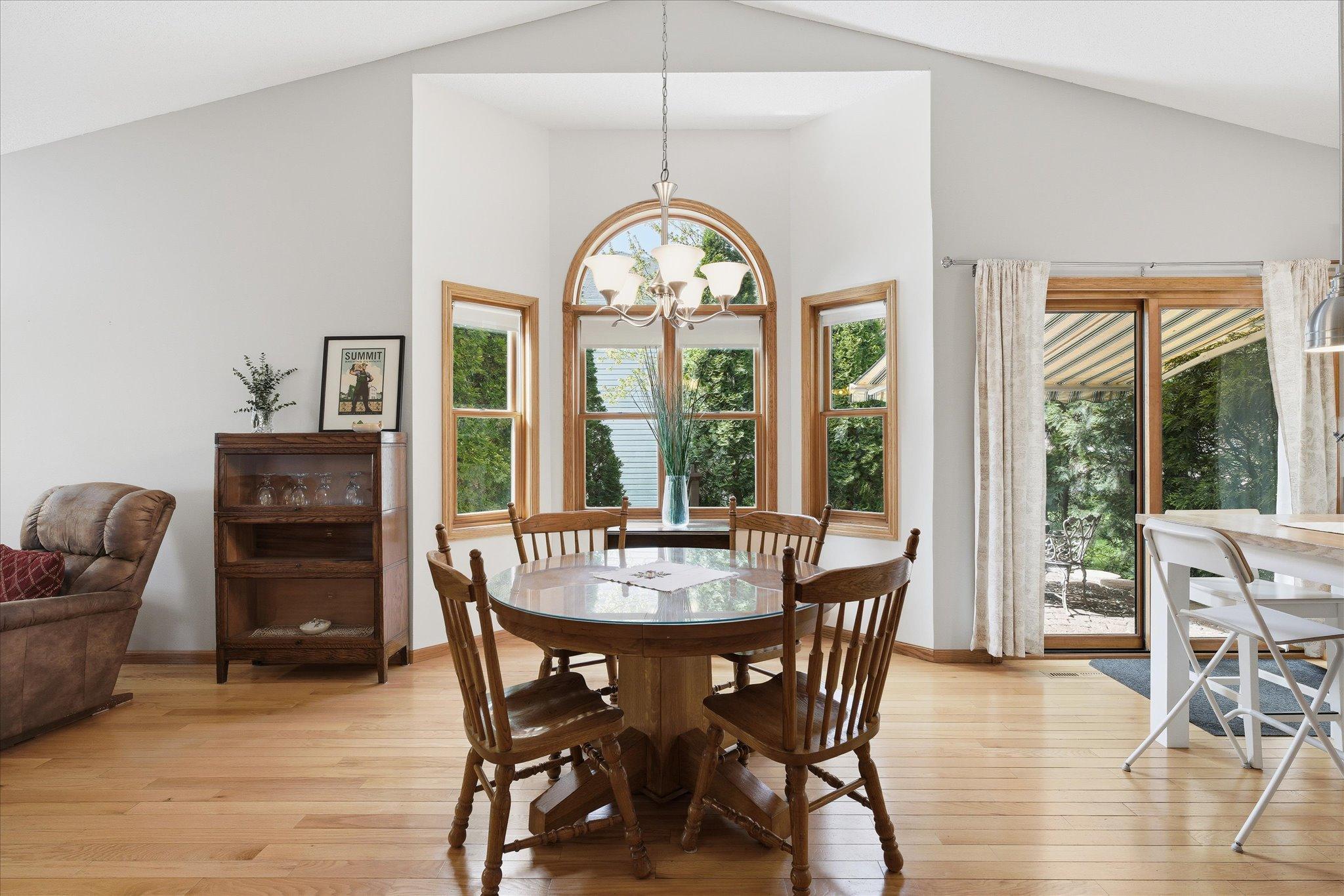 The dining area offers a comfortable setting for intimate dinners and casual gatherings.