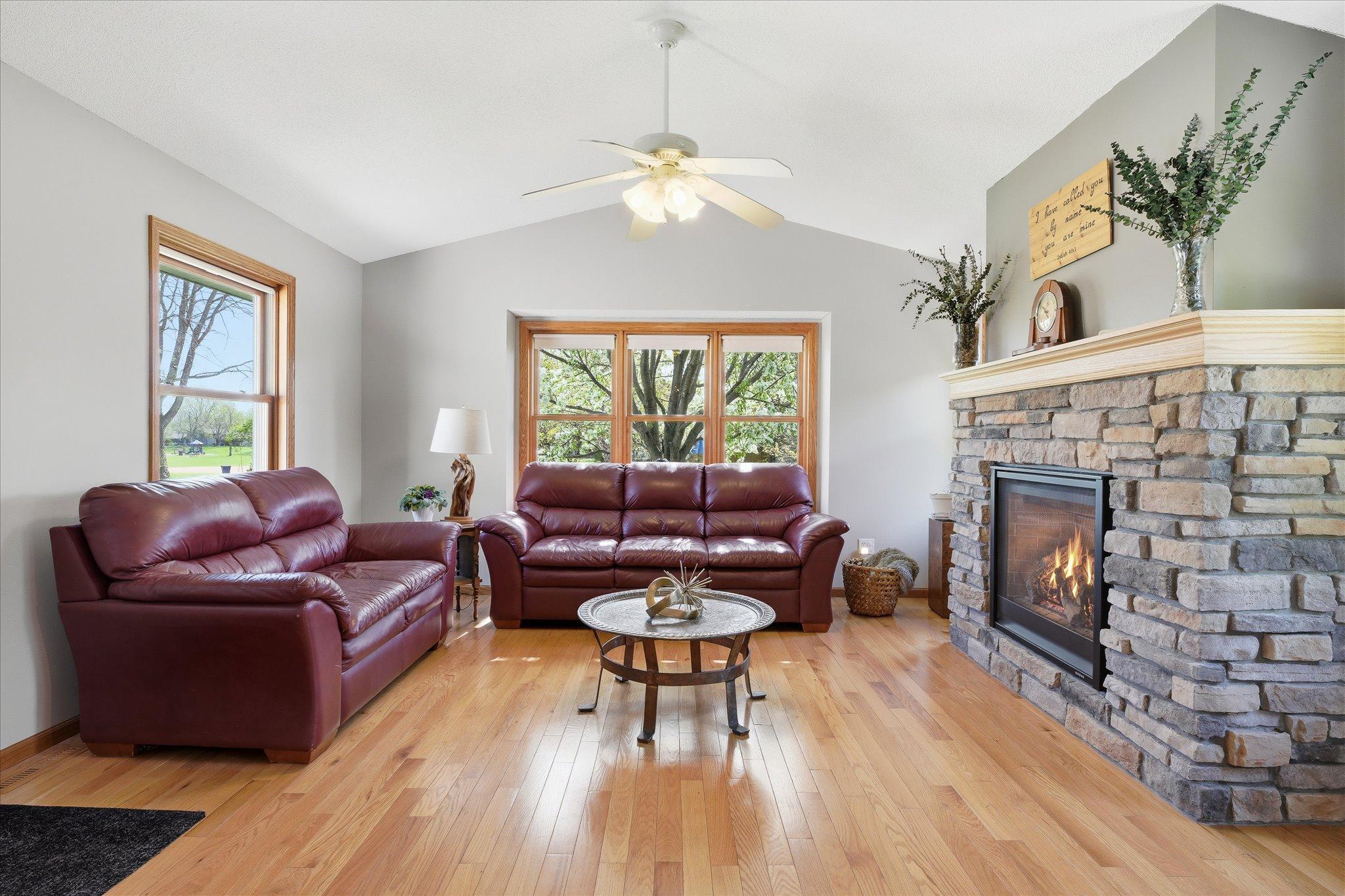The sunroom offers a bright retreat filled with natural light and peaceful views of the backyard.