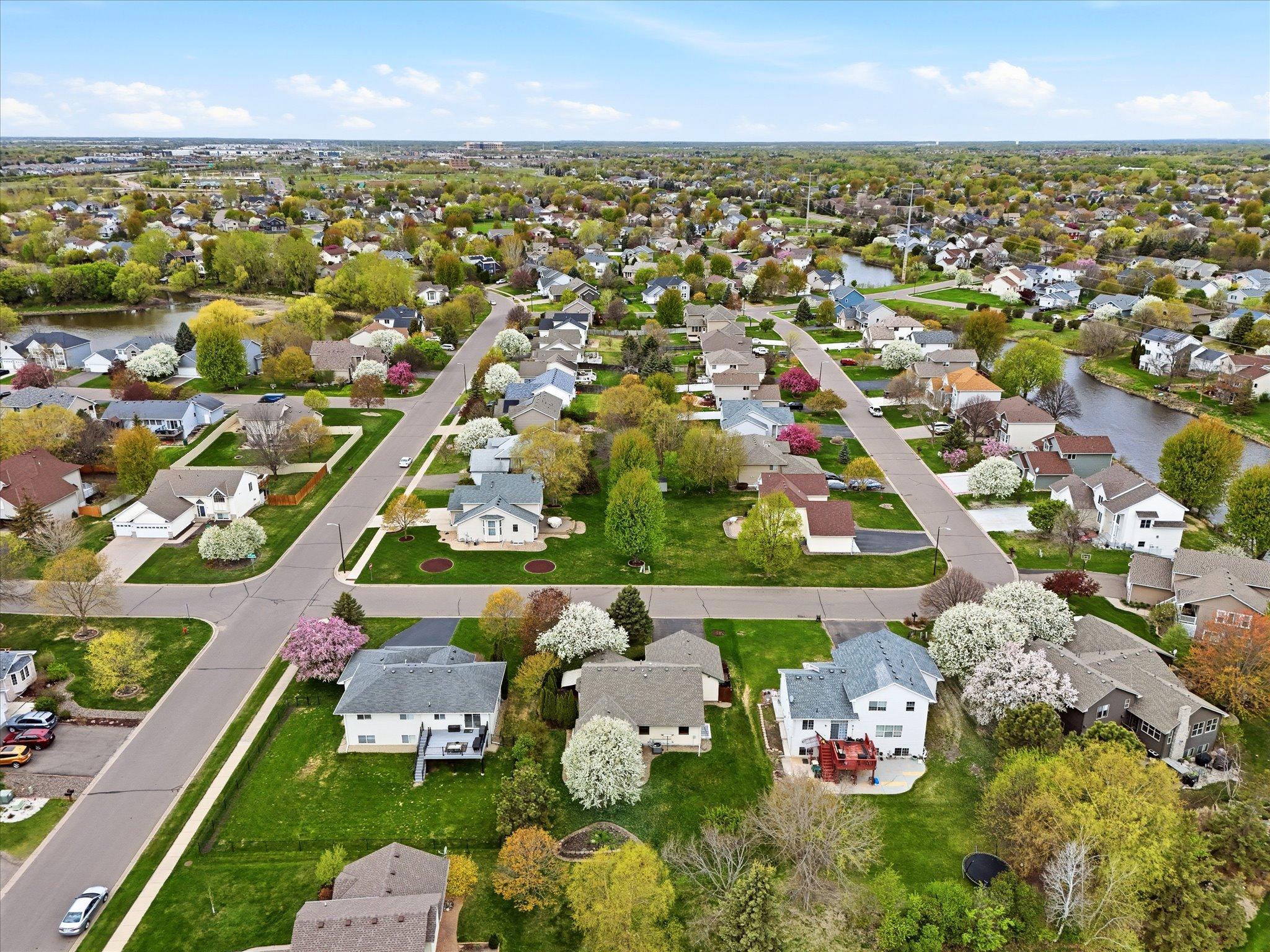This elevated view emphasizes the balance of peaceful residential living and nearby outdoor recreation surrounding the property.