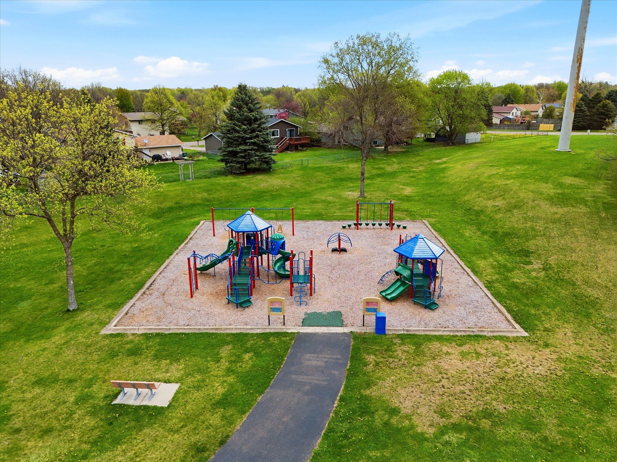 An aerial view highlighting the nearby playground just moments from the home.