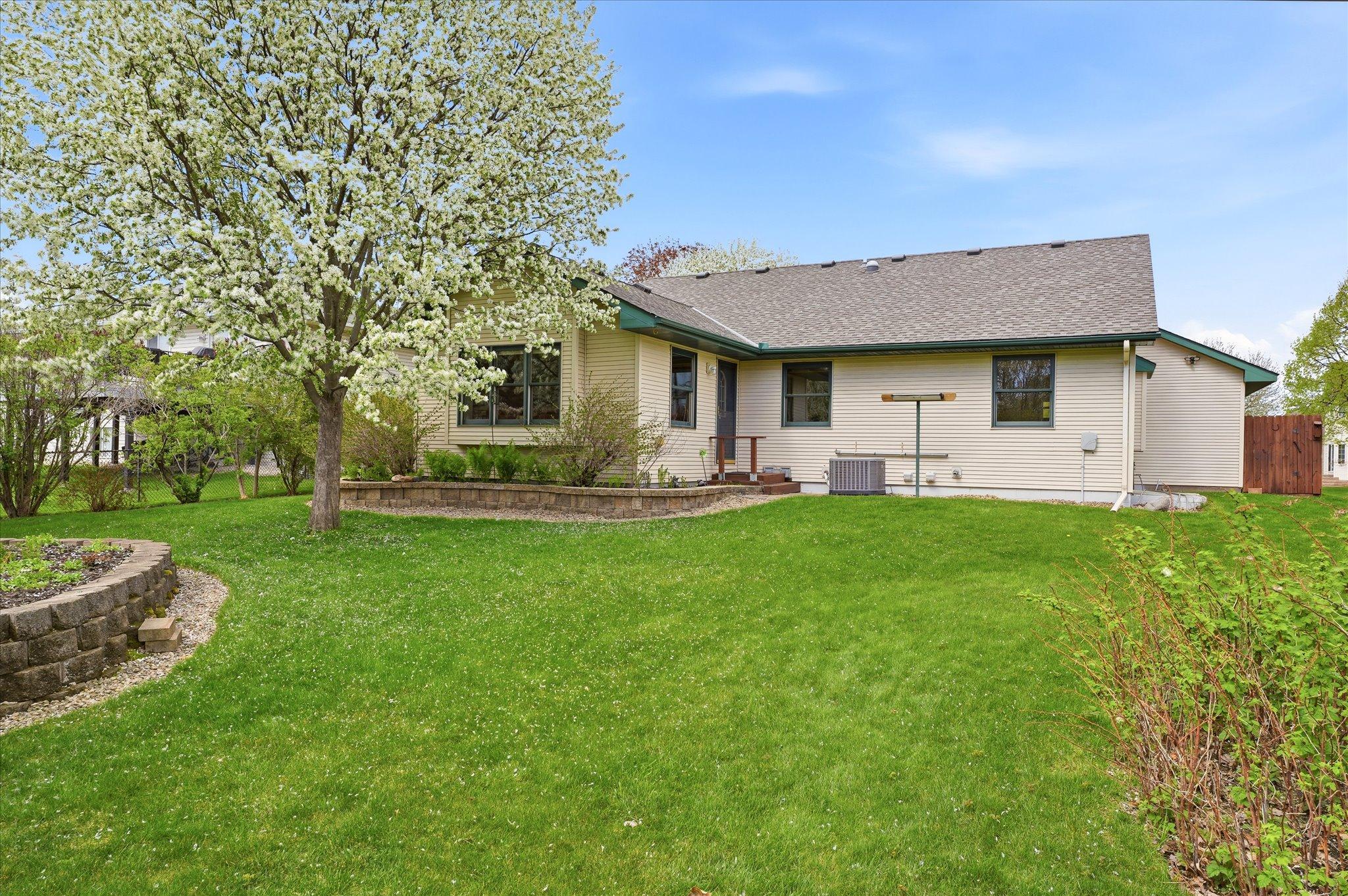 The spacious backyard and patio area create the perfect setting for gatherings, outdoor dining, and enjoying time with friends and family.