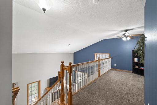 Versatile loft space overlooking the main level