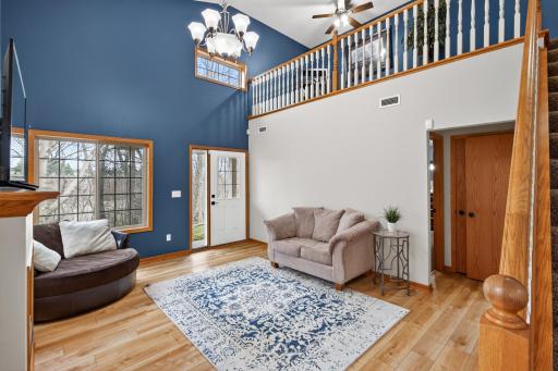 Bright and open living room with soaring vaulted ceilings