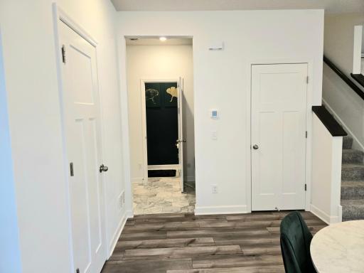 Entry from garage to mudroom and 1/2 bath