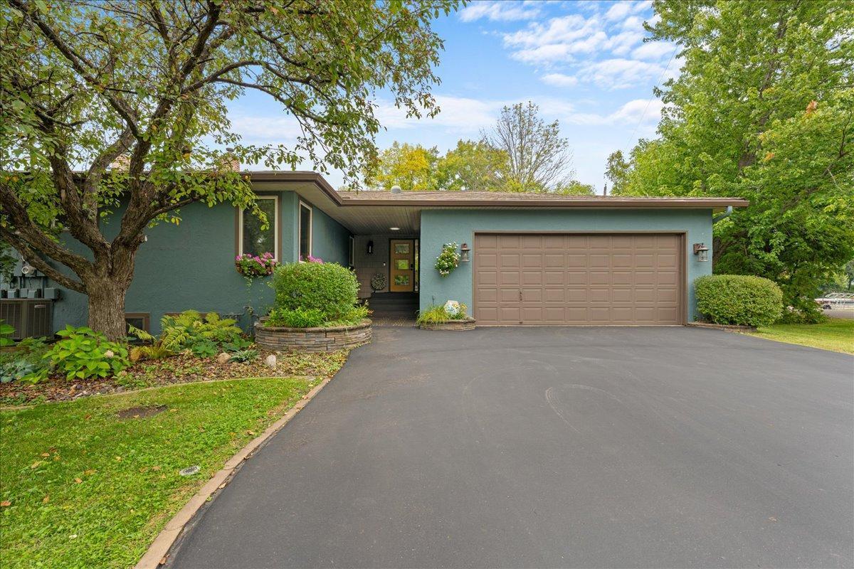 Tastefully updated home for ease of living and peace of mind. The roof was replaced in 2020