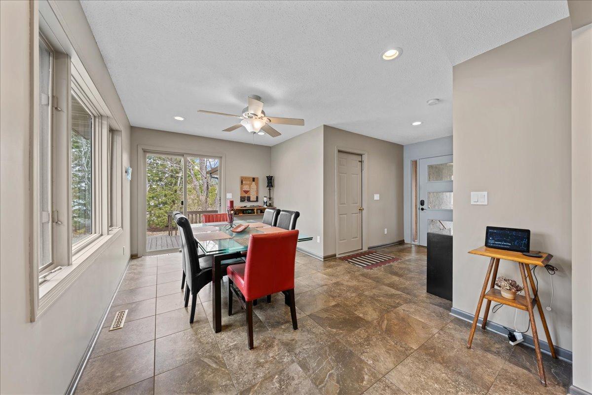 Beautiful large windows and patio door access to one of the decks. Perfect for your lake views