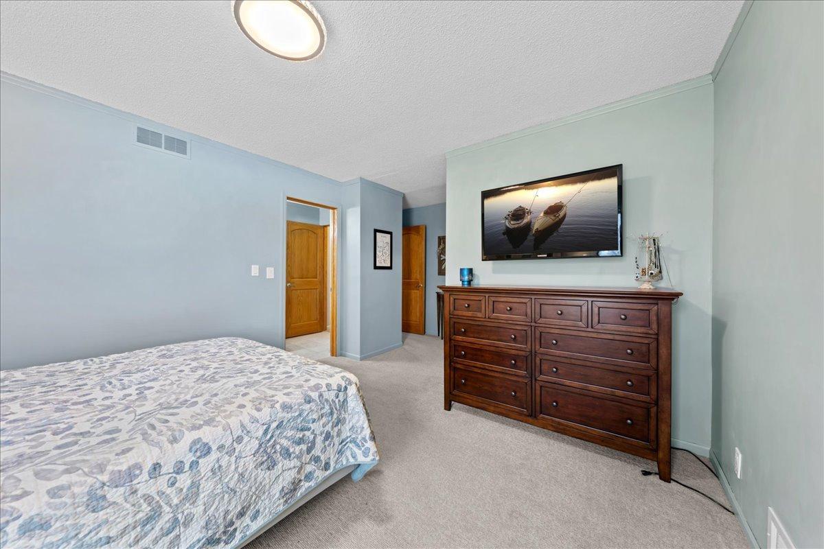 With a walk through bathroom