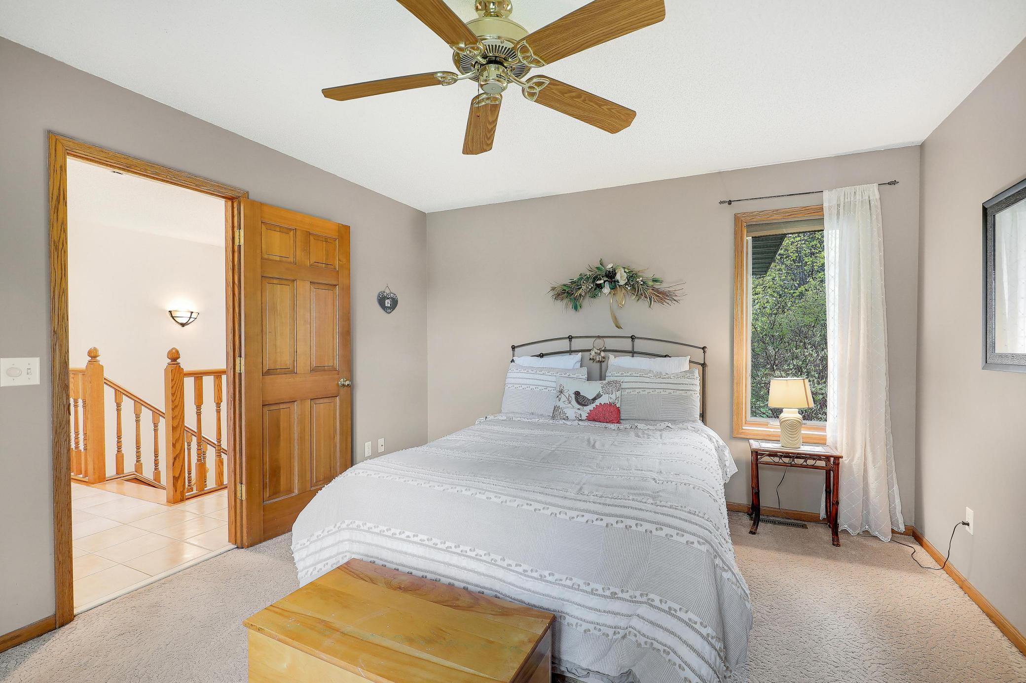 Another view of primary bedroom.