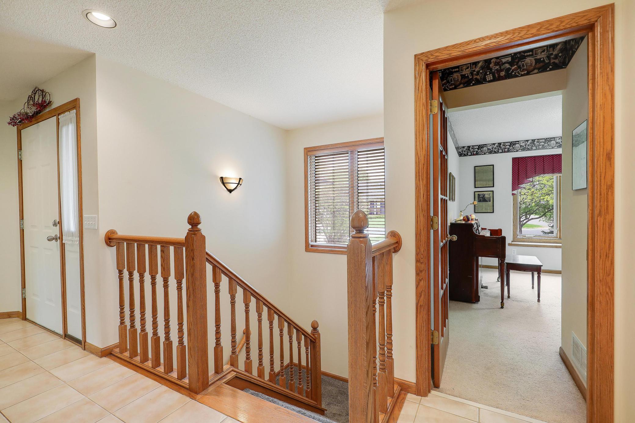 Stairway to finished lower level.