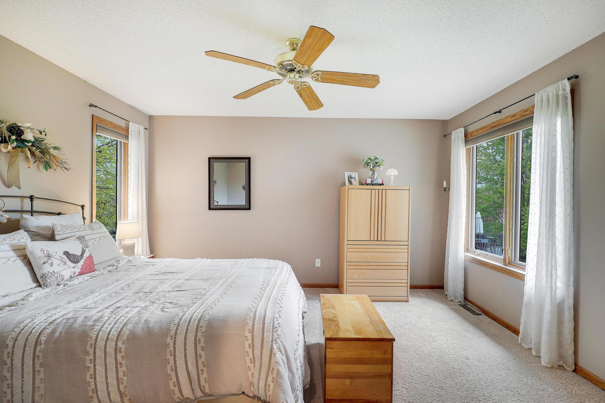 Main level primary bedroom with large windows!