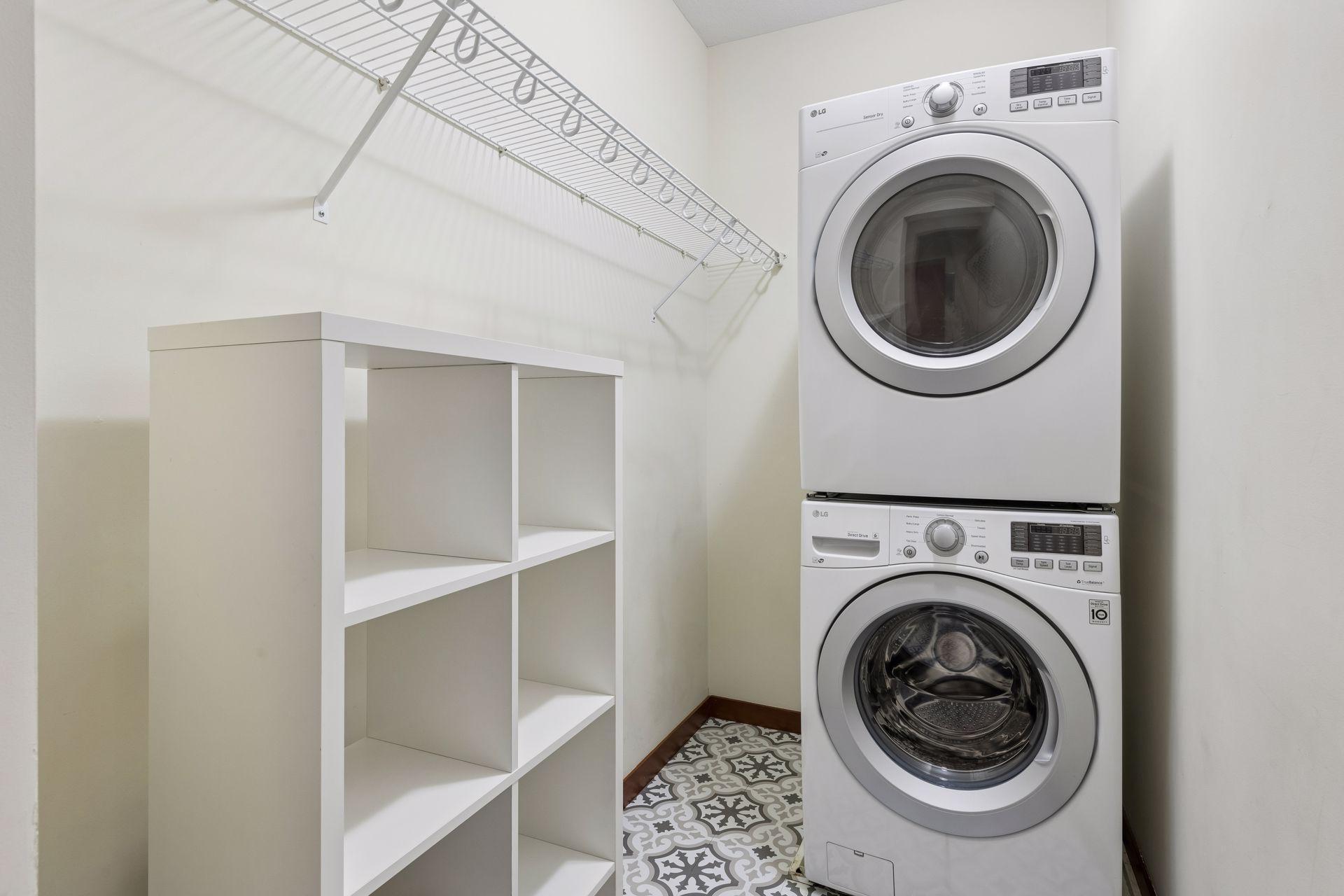 Upper laundry with stackable washer/dryer set.