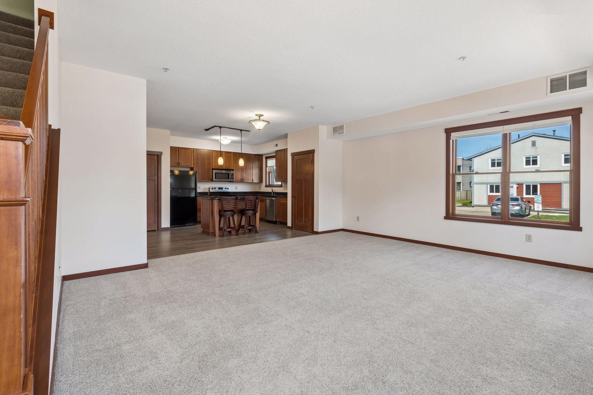 Open concept main floor with updated flooring and paint.