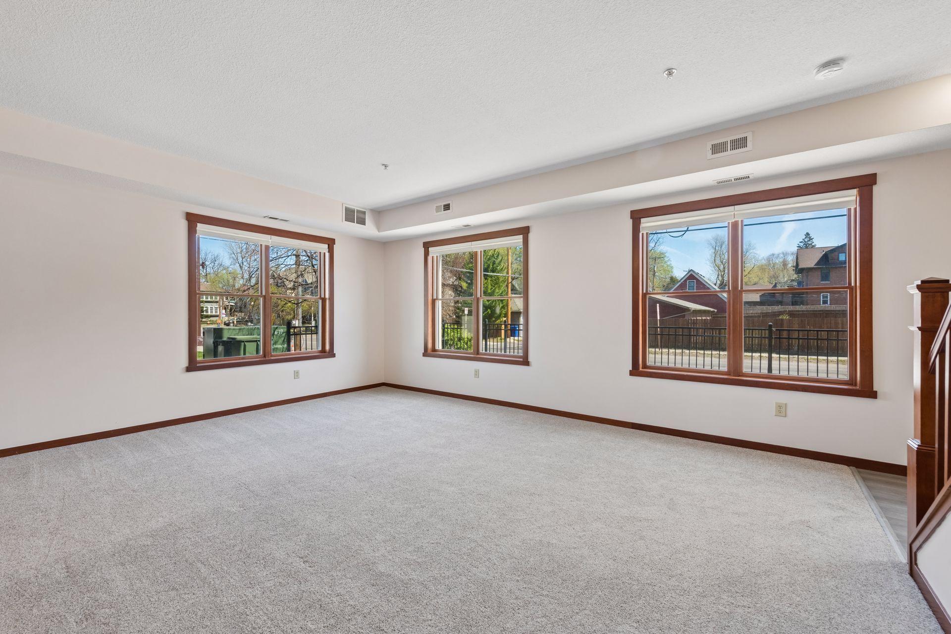 Bright and airy living room with east and north facing windows.