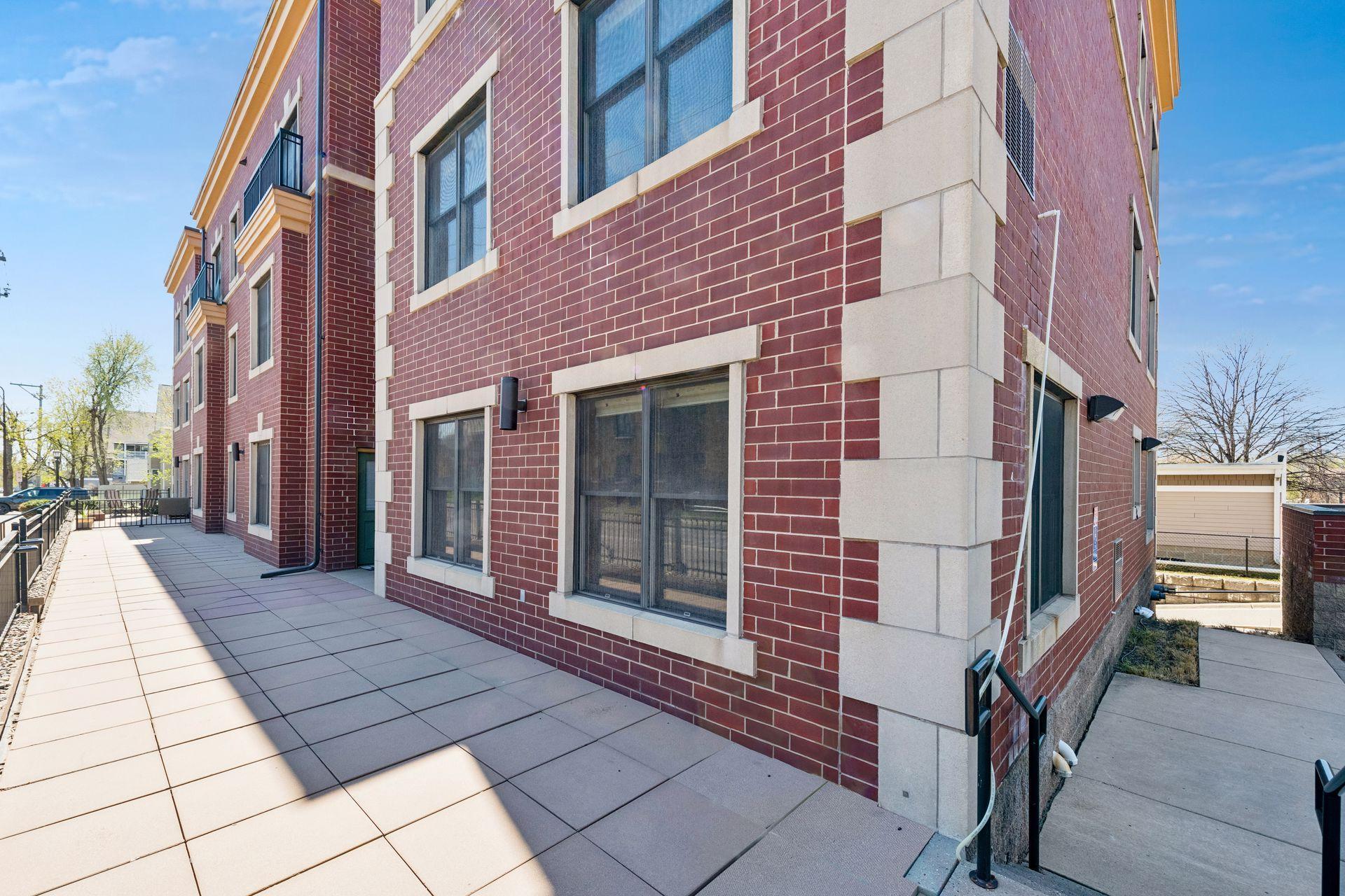 This classic brick, Brownstone inspired 10-unit building was built in 2007. The building provides heated underground parking and a rooftop terrace. Unit #4 offers an additional large front patio.