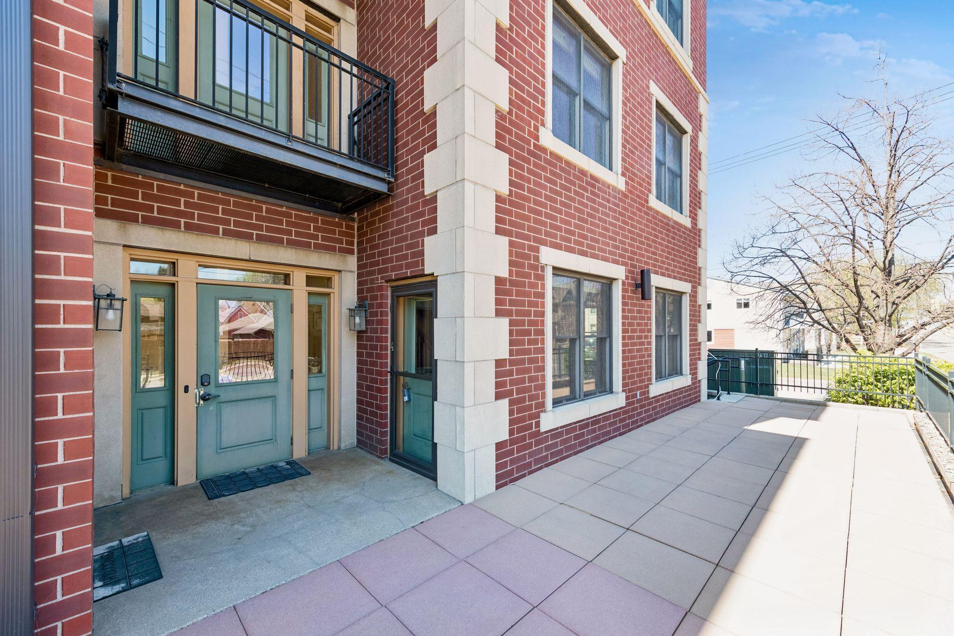 Private front entry. Main floor, 2 story corner unit with wall of east facing windows.