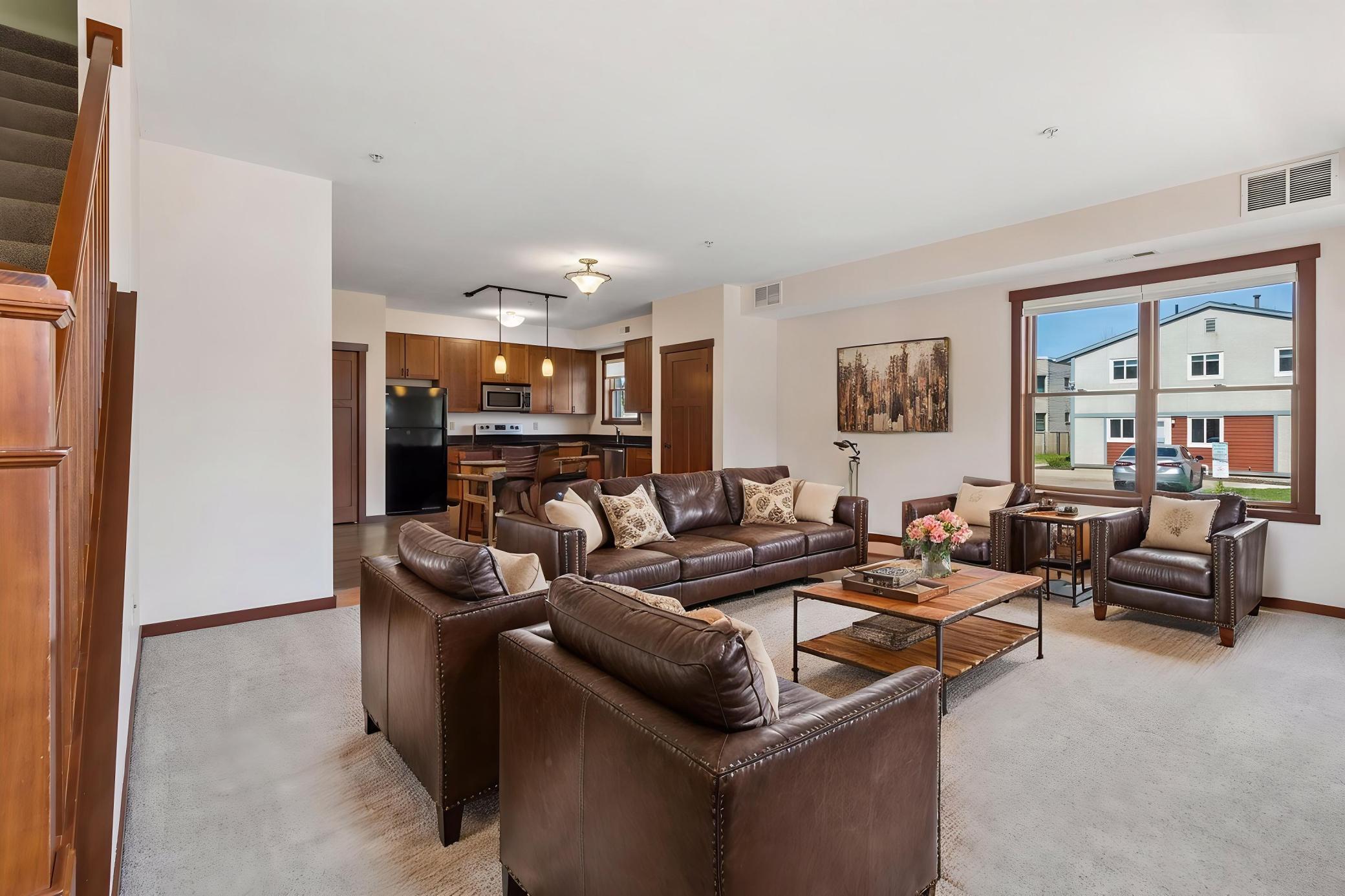 Virtually staged to provide space definition and layout.