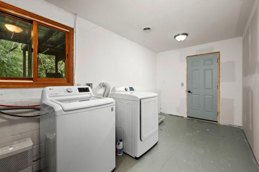 Bright mudroom/laundry room just off the attached two-stall garage! Additional highlights include a new furnace, new AC, and new water heater in 2024!