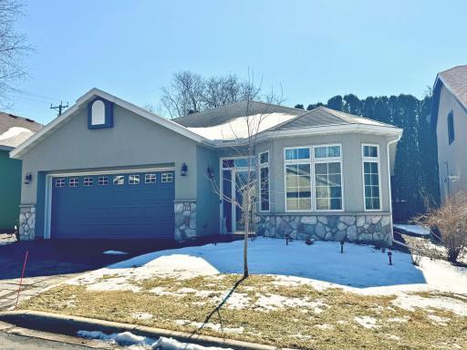 Enjoy The Ease Of ONE-LEVEL Living In This Charming 2-Bedroom, 2-Bathroom HOME! Situated In A Private, Tucked-In Setting, This HOME Offers Immediate Access To The Scenic Mississippi Shoreline And Walking Paths To River Side Park!